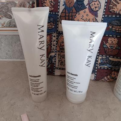 MARY KAY SATIN HANDS AND SOME SAMPLES PLUS A MAKEUP BAG AND BRUSH