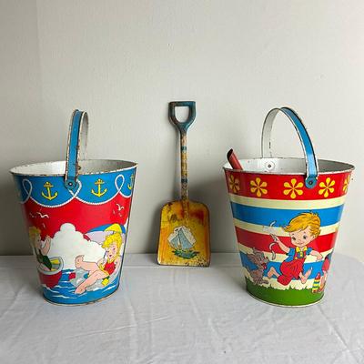 D891 Two Ohio Art Co. Anchor With Kids On Beach With Picnic & Sailboat + Shovel