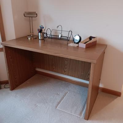 A SIMPLE WRITING DESK WITH LAMP, ETC AND A DESK CHAIR WITH 3 DIFFERENT ADJUSTMENTS