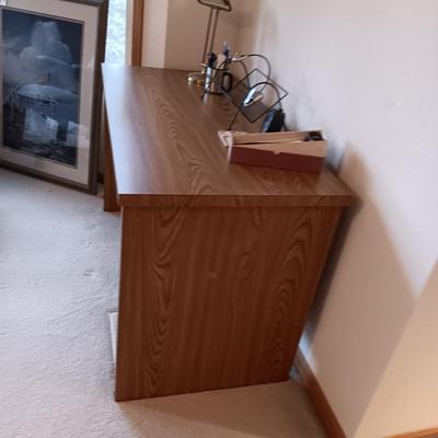 A SIMPLE WRITING DESK WITH LAMP, ETC AND A DESK CHAIR WITH 3 DIFFERENT ADJUSTMENTS