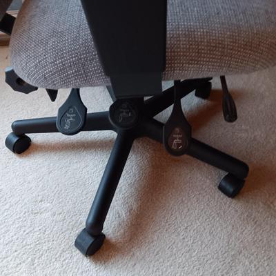 A SIMPLE WRITING DESK WITH LAMP, ETC AND A DESK CHAIR WITH 3 DIFFERENT ADJUSTMENTS