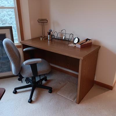 A SIMPLE WRITING DESK WITH LAMP, ETC AND A DESK CHAIR WITH 3 DIFFERENT ADJUSTMENTS