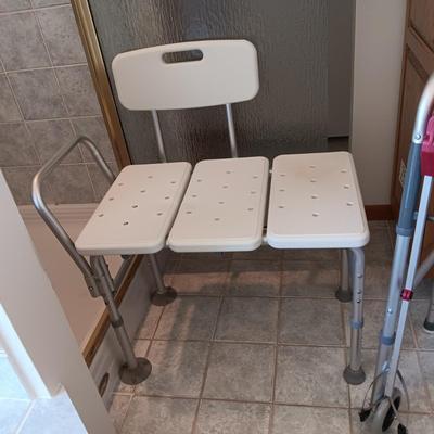 DOUBLE SHOWER SEAT, FOLDING WALKER, BED ASSIST AND A HEATING PAD