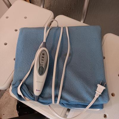 DOUBLE SHOWER SEAT, FOLDING WALKER, BED ASSIST AND A HEATING PAD