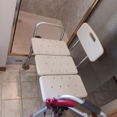 DOUBLE SHOWER SEAT, FOLDING WALKER, BED ASSIST AND A HEATING PAD