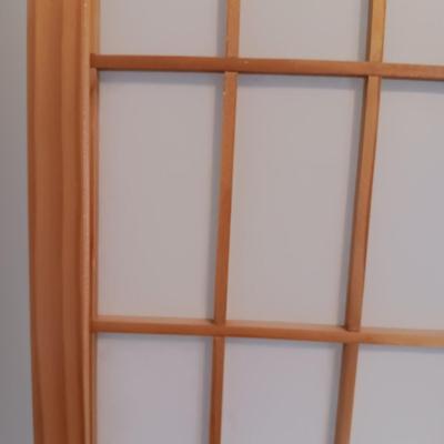 A ROOM SCREEN AND AN ADJUSTABLE BRASS COLORED FLOOR LAMP