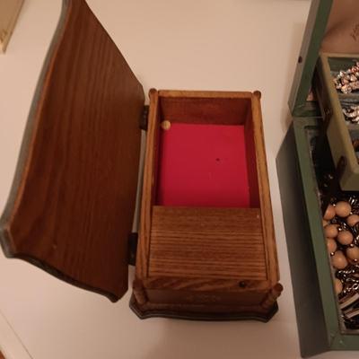 REUGE MUSICAL JEWELRY BOX AND A COLLECTION OF COSTUME JEWELRY