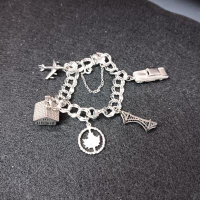 STERLING SILVER CHARM BRACELET 27.61g