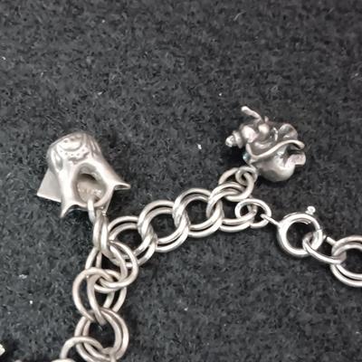 STERLING SILVER CHARM BRACELET 38.41g