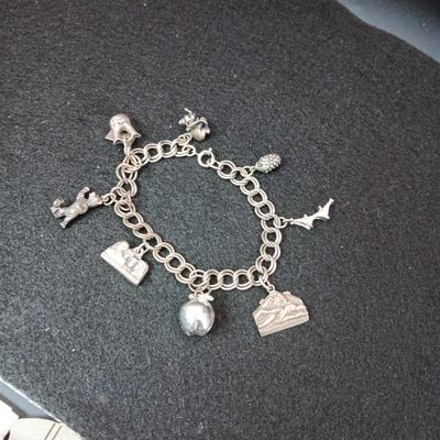 STERLING SILVER CHARM BRACELET 38.41g