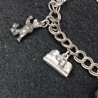 STERLING SILVER CHARM BRACELET 38.41g