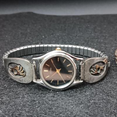 STERLING SILVER AND 14K WATCH BAND MARKED WM ROGERS AND STERLING BRACELET MARKED H MACE