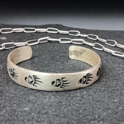 STERLING SILVER PENDANT ON A CHAIN AND A STERLING BRACELET 45.52g
