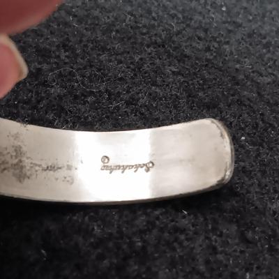 STERLING SILVER PENDANT ON A CHAIN AND A STERLING BRACELET 45.52g