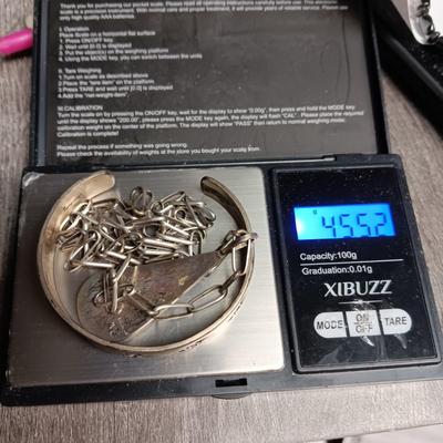 STERLING SILVER PENDANT ON A CHAIN AND A STERLING BRACELET 45.52g