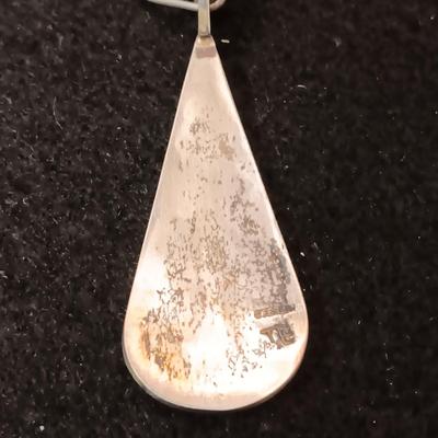 STERLING SILVER PENDANT ON A CHAIN AND A STERLING BRACELET 45.52g