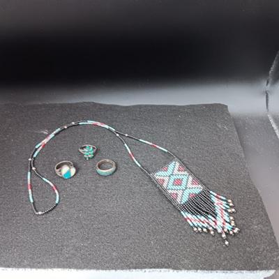 HAND BEADED NECKLACE WITH A POUCH AND 3 STERLING SILVER RINGS SIZES 5 & 6