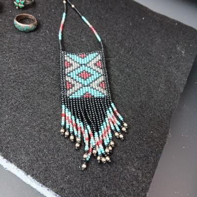 HAND BEADED NECKLACE WITH A POUCH AND 3 STERLING SILVER RINGS SIZES 5 & 6