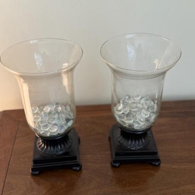 Two glass urns with decorative glass stones