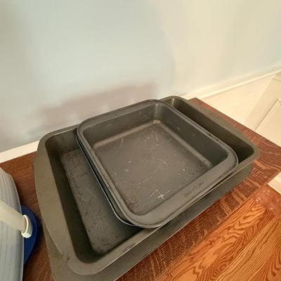 Lot of cooking pans and 12 cupcake carrier
