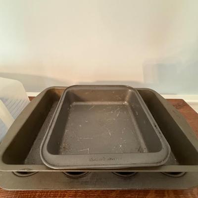 Lot of cooking pans and 12 cupcake carrier