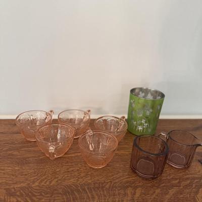 Four depression ware glasses, sugar and creamer and green glass