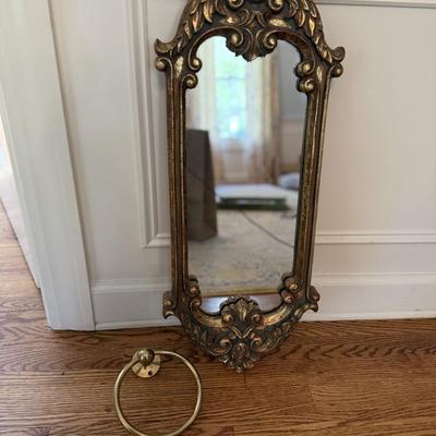 Beautiful gold mirror and towel ring