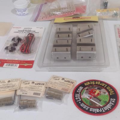 Collection of Model Train Repair and Accessory Pieces (L)