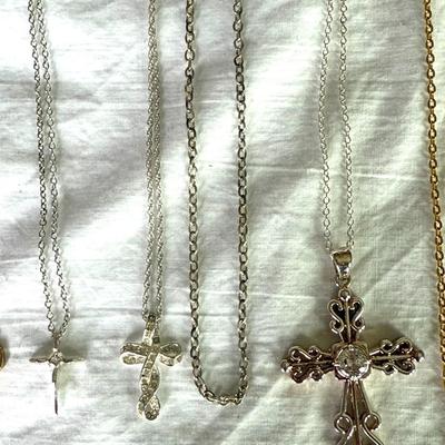 Variety of Gold tone crosses & watch