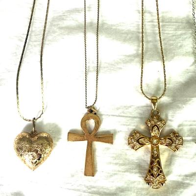 Variety of Gold tone crosses & watch