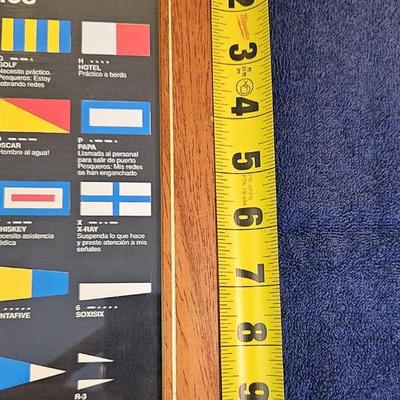 Framed International Code of Signals, a System of Flags used for Communication between ships