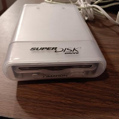 SUPERDISK USB DRIVE FOR MACINTOSH, 3 DRAWER ORGANIZER AND A SAMSUNG FLIP PHONE