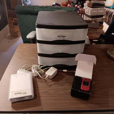 SUPERDISK USB DRIVE FOR MACINTOSH, 3 DRAWER ORGANIZER AND A SAMSUNG FLIP PHONE