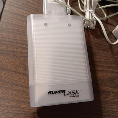 SUPERDISK USB DRIVE FOR MACINTOSH, 3 DRAWER ORGANIZER AND A SAMSUNG FLIP PHONE