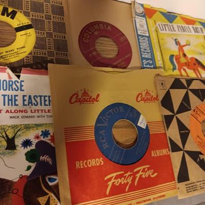 MUSIC ON CD'S, SONY WALKMAN CD PLAYER WITH REMOTE, EARBUDS, DISC HOLDER AND SOME 45'S RECORDS