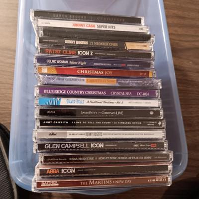 MUSIC ON CD'S, SONY WALKMAN CD PLAYER WITH REMOTE, EARBUDS, DISC HOLDER AND SOME 45'S RECORDS