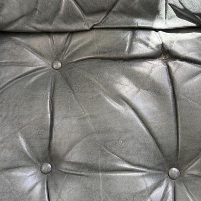 Hunter green tufted leather chair
