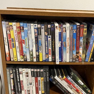 Lot of DVD’s and shelf