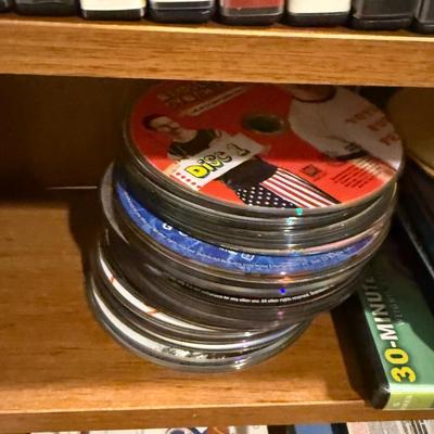 Lot of DVD’s and shelf