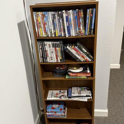 Lot of DVD’s and shelf