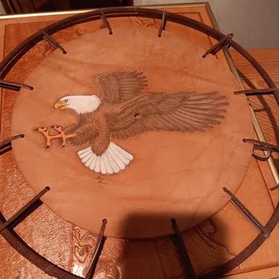 ARTWORK DONE ON LEATHER, WOODEN TOY RIFLE AND COFFEE TABLE BOOK