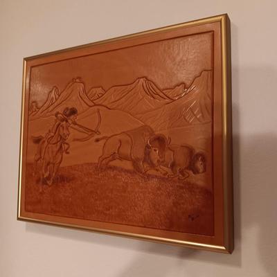 ARTWORK DONE ON LEATHER, WOODEN TOY RIFLE AND COFFEE TABLE BOOK