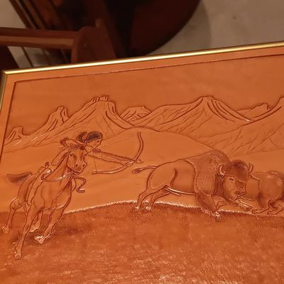 ARTWORK DONE ON LEATHER, WOODEN TOY RIFLE AND COFFEE TABLE BOOK