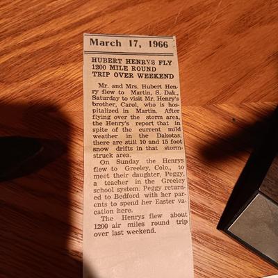 LEATHER PILOT CAP, TROPHIES AND NEWS ARTICLES REGARDING THE FATHER OF 2 SISTERS