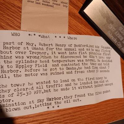 LEATHER PILOT CAP, TROPHIES AND NEWS ARTICLES REGARDING THE FATHER OF 2 SISTERS