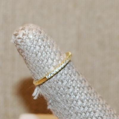 Size 5 Delicate Half Infinity Style Ring with Tiny Clear Stones on a Gold Tone Band (1.2g)