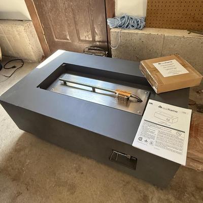 Brand new, never used Real Flame gas fire table. Retails for over $900