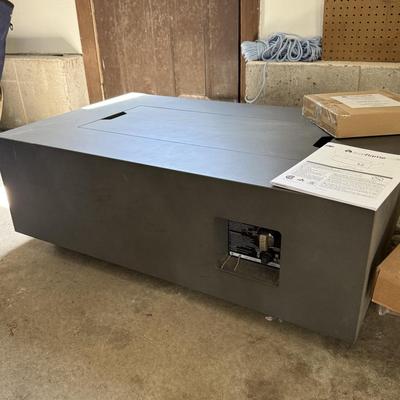 Brand new, never used Real Flame gas fire table. Retails for over $900