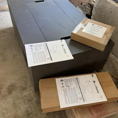 Brand new, never used Real Flame gas fire table. Retails for over $900