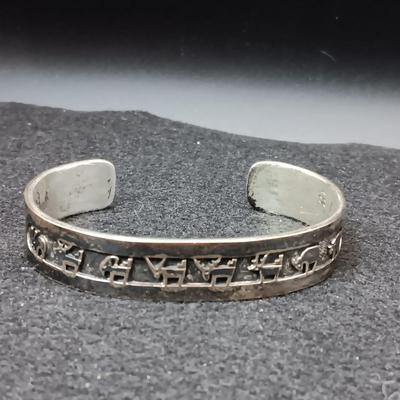 2 STERLING SILVER CUFF BRACELETS (1 IS SIGNED ARTIE YELLOWHORSE) 81.32g